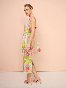 Indulge in luxury with our Robe Rachel Gilbert, designed for the sophisticated woman. Featuring a beautiful floral print, delicate spaghetti straps, and a bodycon silhouette, this midi dress is perfect for summer events and prom. The contrasting colors and elegant backless design make it a must-have for your wardrobe.