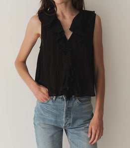 Experience true luxury with the Hilda Top by DOEN. Made from soft, lightweight organic cotton voile, this sleeveless top is a nod to our bestselling Henri Top. The plunging V-neckline is elegantly adorned with cascading lace-trimmed ruffles, while clustered pintucks add texture to the yoke and back. With hidden starburst buttons down the front, this top is the perfect blend of sophistication and charm.