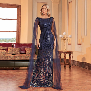 Introducing the Robe Aidee - a mermaid evening dress that will make you stand out in any crowd. With a stunning sequin design and elegant sleeveless cut, this dress exudes luxury and sophistication. Prepare to be the center of attention at any event with this exclusive and tasteful piece.