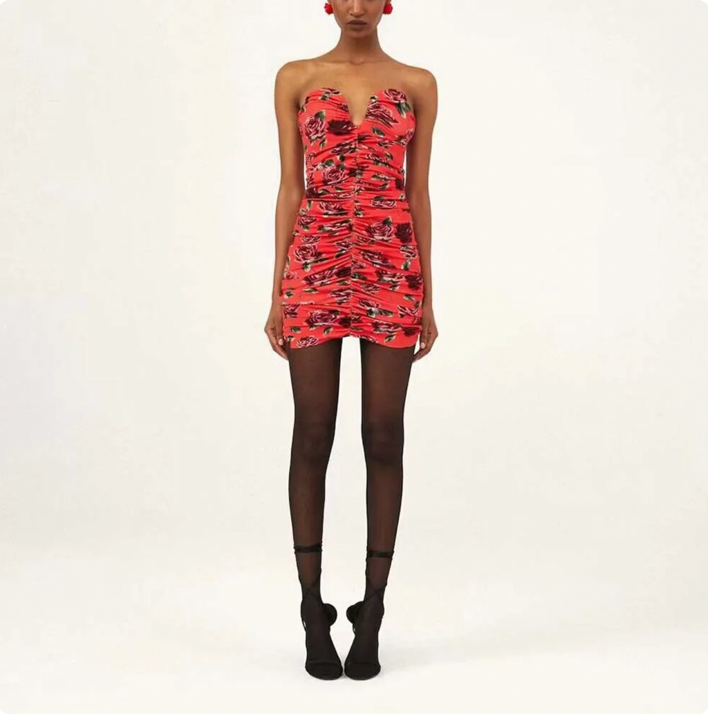 Dress up in Magda Butrym's theatrical vision with this dynamic rose-printed bandeau minidress. Sculpting the silhouette with an exaggerated sweetheart neckline, this style has a ruched center and a notched hem.