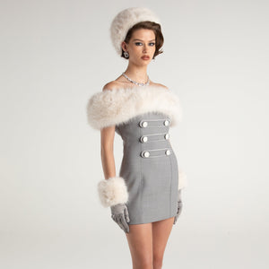 Channel your inner winter princess with our Lina Fur Dress. This mini dress combines the sophistication of a European military uniform with a touch of whimsy. The fur shoulder detailing adds a feminine touch while the unified buttons create a polished look. Perfect for making a statement, pair with tall boots or heeled sandals.