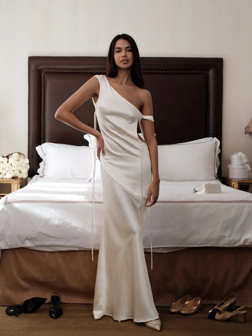 Unleash your inner 90s goddess with the Gabrielle Maxi Dress. This slinky slip is cut on the bias for a flattering, draped effect. With an open back and tie strings straps, this delicate dress is perfect for any occasion. Timeless style that will turn heads.