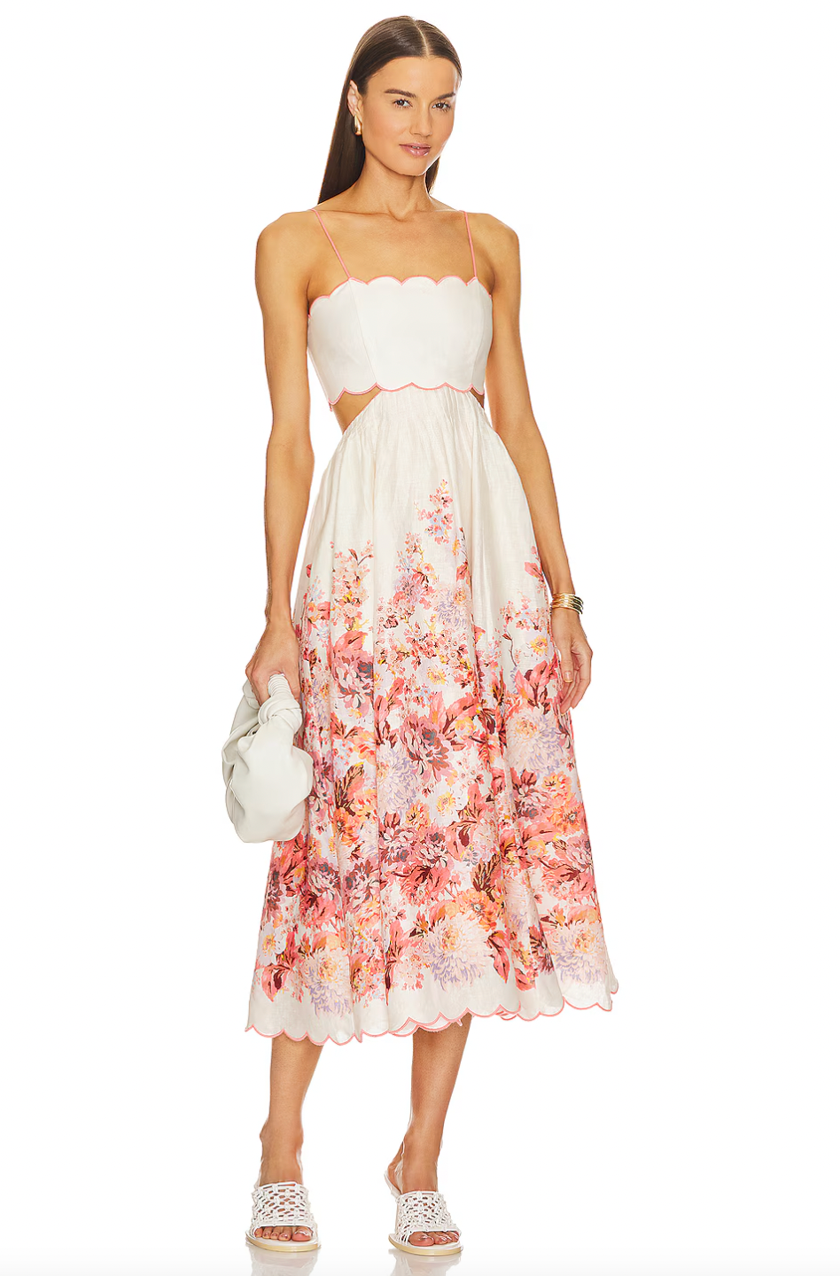 Indulge in the luxurious style of Zimmermann with the Devi Midi Dress. Designed by the iconic brand, this dress exudes elegance and sophistication. The perfect choice for any special occasion, it features a midi length that flatters your figure and adds a touch of glamour. Elevate your wardrobe with this stunning piece.