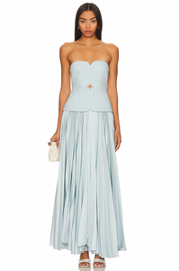 Indulge in the sophistication and elegance of Avonlea Midi Dress. This elegant blue pleated dress features a patchwork design, off-shoulder sleeves, and a slimming silhouette. Perfect for any occasion, it will make you feel confident and sexy. Embrace your femininity with this luxurious and exclusive piece.