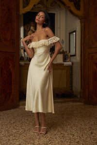 This elegantly designed Sonata Lady Length Dress features an off the shoulder neckline, adding a touch of femininity to your look. The bias cut of the dress and lace trim add a delicate and sophisticated touch. Designed for comfort and support, it includes silicone gripper elastic and boning on the upper bodice. Indulge in luxury and beauty with this dress!