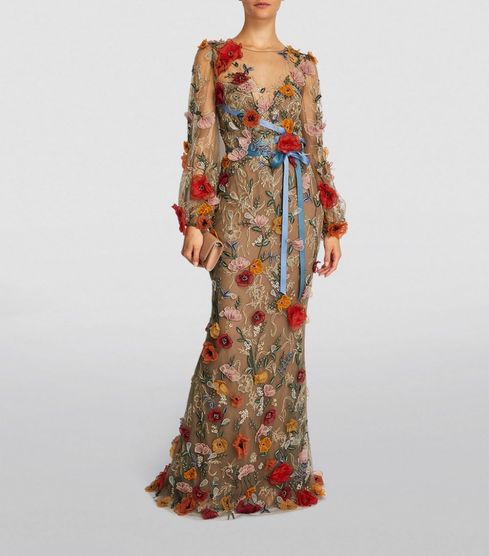 Indulge in luxury with the Robe Calandre featuring the breathtaking MARCHESA design and exquisite floral appliqués. Perfect for any special occasion, this gown showcases the perfect combination of elegance and beauty. Made from high-quality materials, this gown is sure to make a lasting impression.