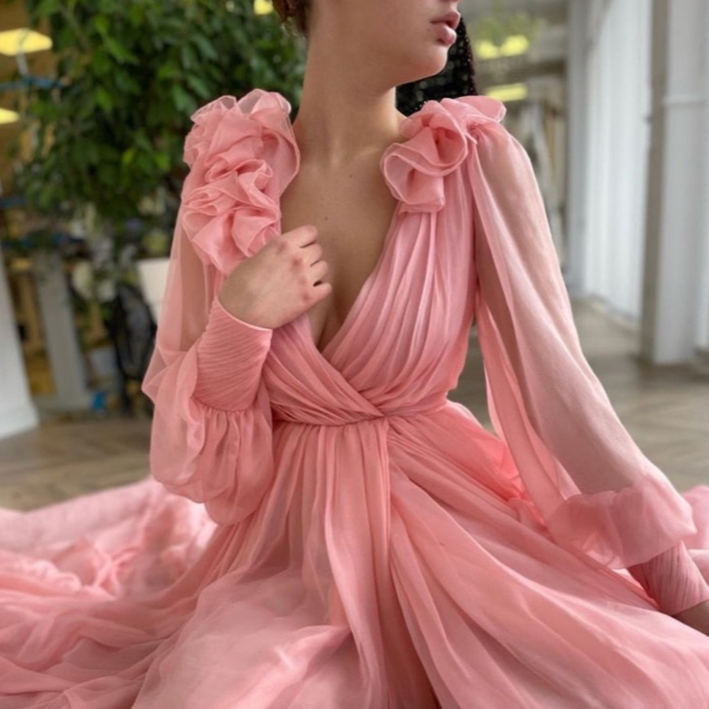 Robe Myka is a stunning cocktail gown adorned with delicate pink flowers, making it a gorgeous addition to any wardrobe. Its elegant design exudes sophistication, perfect for formal events and special occasions. Elevate your style with this beautiful piece.