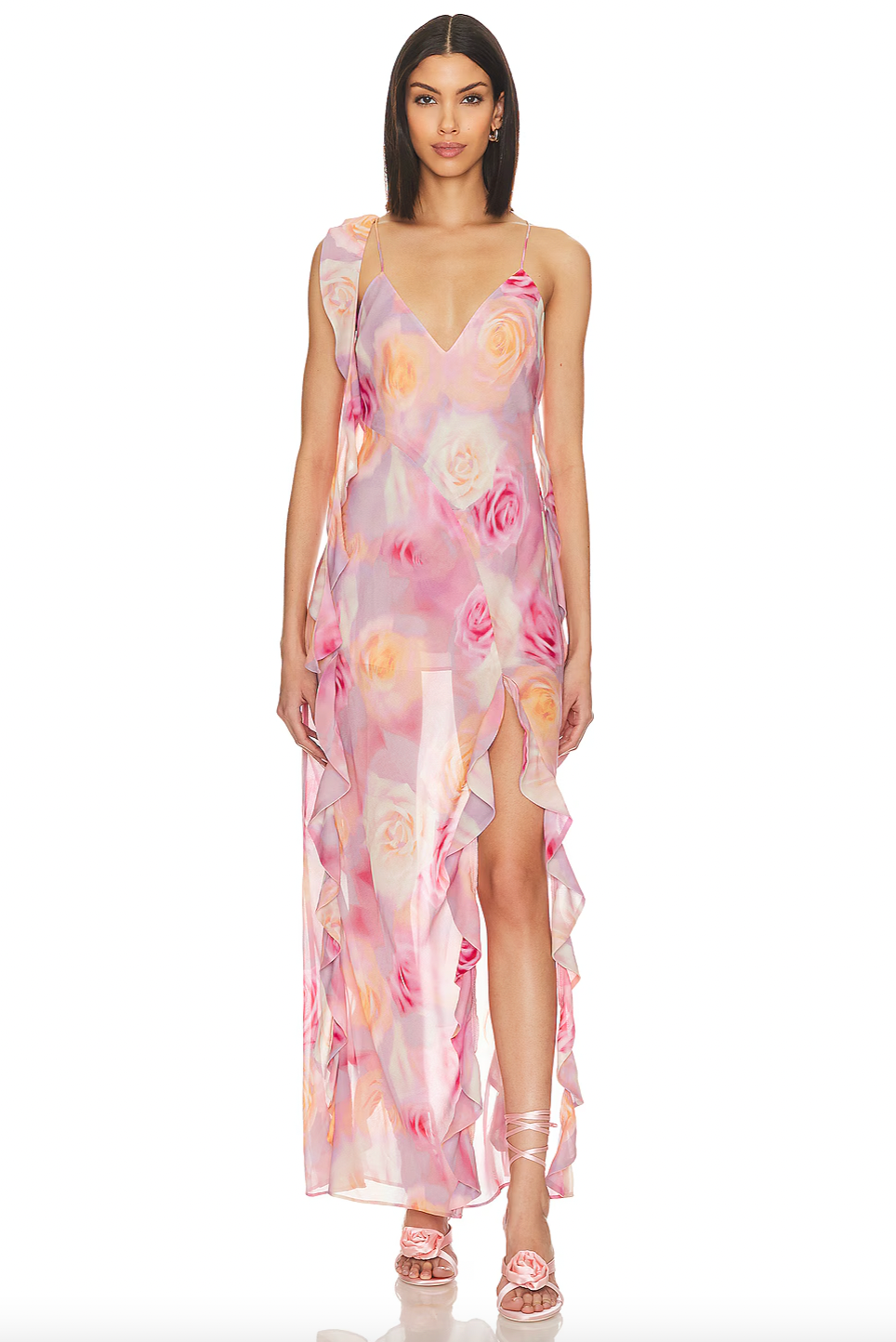 Unleash your inner romantic with the Beate Maxi Dress. With a dreamy rose print and cascading ruffles, this pink asymmetrical dress exudes charm and elegance. The removable shoulder ruffle and thigh-high slit add a touch of playfulness.