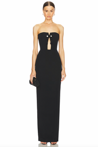 The Imani Gown features a hidden back zipper closure, boned bodice with neckline cut-out and tassel accent, and a crepe fabric with back vent. With its elegant design and functional details, this gown provides a seamless and comfortable fit for any formal occasion. Effortlessly make a statement and turn heads with this sophisticated and stylish piece.