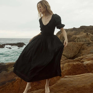 In a soft, lightweight blend of organic cotton and viscose, the Ischia Dress—a Favorite Character that made its debut in Spring 2021 and remains a bestseller—features double-puffed elbow-length sleeves and a scoop neckline accented with a functional center tie. A smocked bodice gives way to a full, ankle-grazing skirt, while a waist tie allows you to adjust the fit. Petite ruffles adorn the sleeve cuffs and neckline.