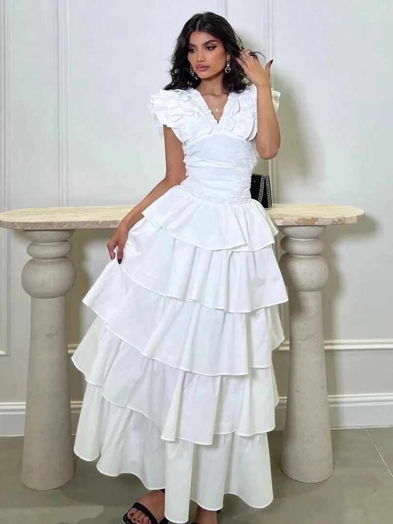 This elegant vintage dress features a simple yet sophisticated ruffle A-line design with a V-neckline and ankle-length cut. It can be fully customized to fit the occasion and is perfect for formal events or evening parties. Make a statement and stand out in this beautiful prom dress.