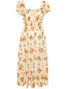 The Clarinet Floral-Print Midi Dress by Doen features a pale yellow floral print, a square neck, and short puff sleeves with elasticated cuffs. The smocked waist and bow detail at the front create a flattering silhouette. Perfect for adding a touch of spring to your wardrobe.