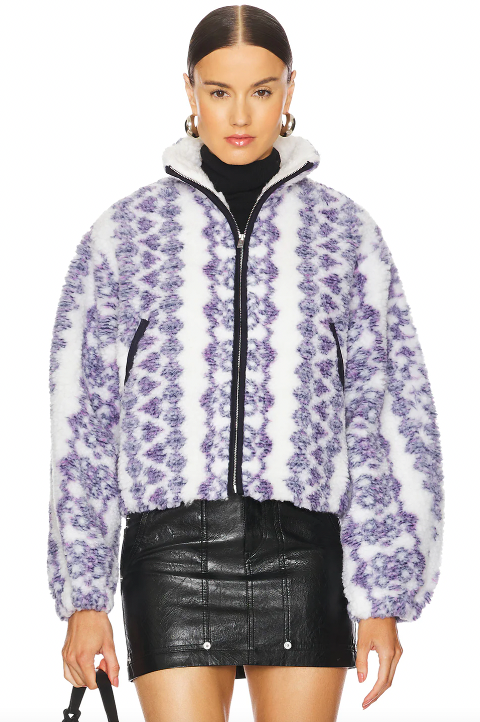 The Mackensy Coat by Isabel Marant features a unique short printed shearling style that is bound to turn heads. With its luxurious design and high-quality materials, this coat is perfect for keeping you warm and stylish during the colder months. Elevate your wardrobe with the Mackensy Coat!