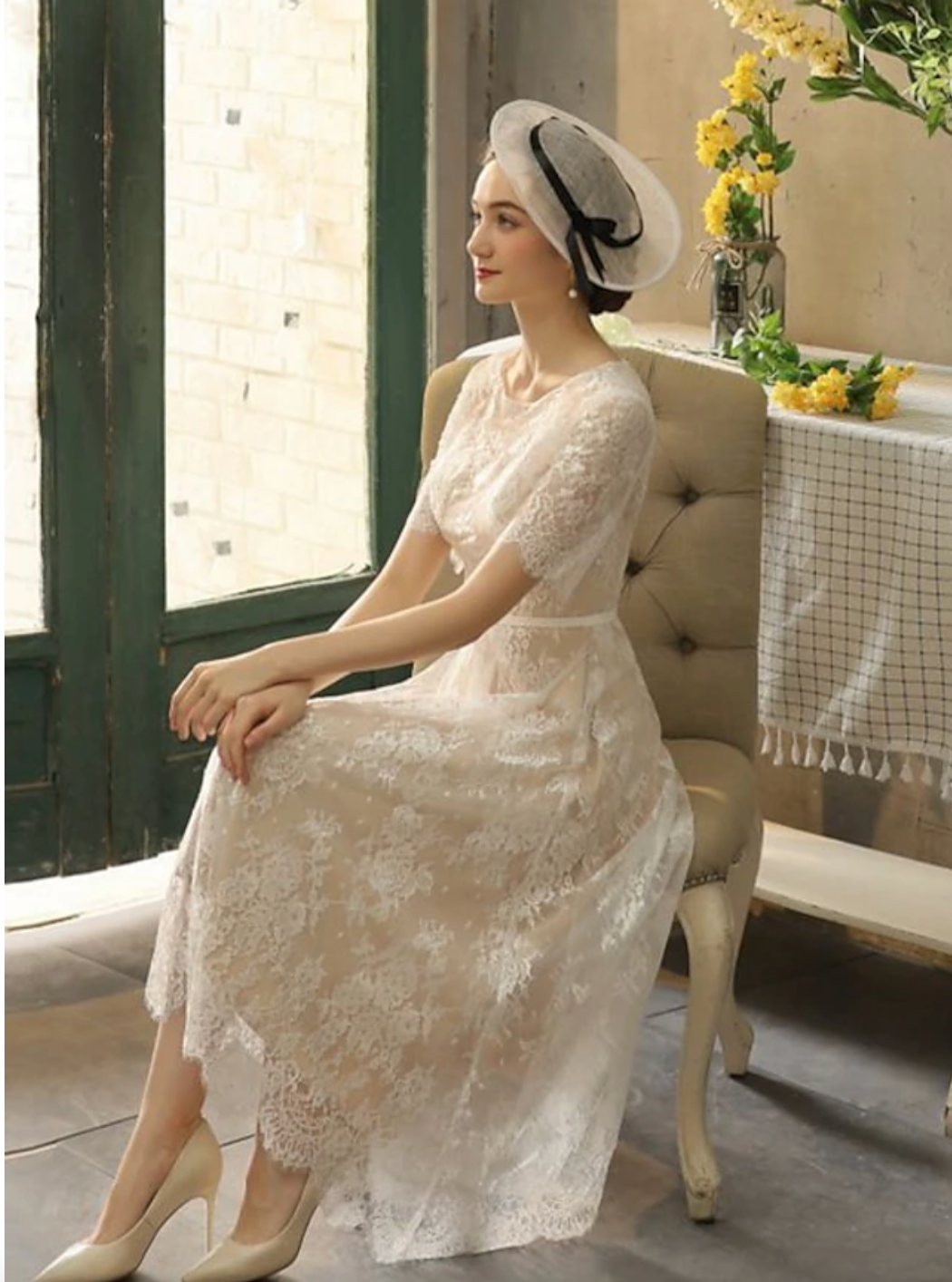 Introducing the Robe Violet, a stunning vintage tea length lace dress. This beautiful dress combines vintage elegance with modern design, creating a unique and timeless piece for any occasion. The delicate lace adds a touch of romance, while the tea length provides a flattering silhouette. Bring out your inner beauty with the Robe Violet.