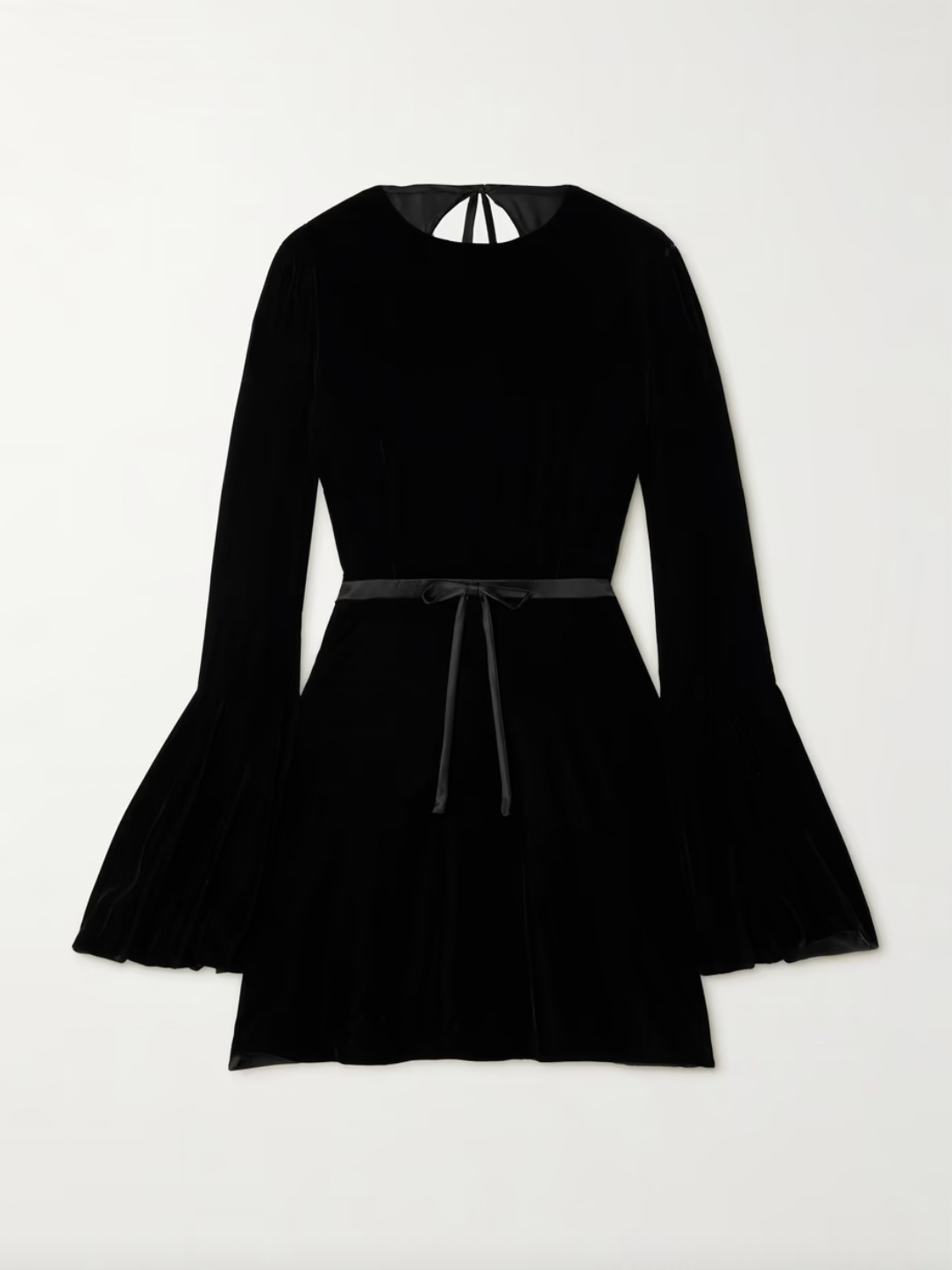 Indulge in opulence with SAINT LAURENT's velour mini dress. The retro-inspired bell sleeves and flared skirt exude a skater vibe, while the open back adds a touch of sensuality. Made in Italy, the plush velour is elevated by a satin belt that cinches your waist. Complete the look with stilettos and a mini bag.