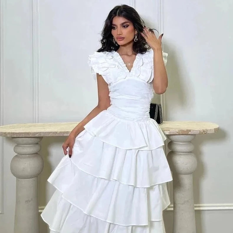 This elegant vintage dress features a simple yet sophisticated ruffle A-line design with a V-neckline and ankle-length cut. It can be fully customized to fit the occasion and is perfect for formal events or evening parties. Make a statement and stand out in this beautiful prom dress.