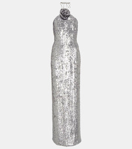 Looking to make a statement? The Magda Butrym Sequin Maxi Dress in Silver is a must-have item for your wardrobe. Its lightweight yet structured fabric creates a beautiful silhouette, while the soft and feminine color adds a touch of elegance. Perfect for any special occasion, this dress will be a timeless staple in your closet.