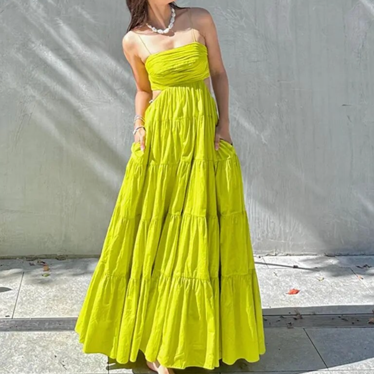 This stunning Aje Satre maxi dress is perfect for any summer occasion. Made of breathable cotton with a high waist, slash neck, and backless design, it offers both comfort and style. Dress it up or down for a versatile and chic addition to your wardrobe!