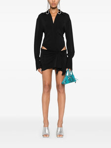 Expertly designed in Italy, The Attico Cut-out Mini Dress is the perfect addition to any fashionable wardrobe. The stretch-design allows for comfortable all-day wear, while the draped and gathered detailing adds a touch of elegance. Complete with a logo print, pointed collar, and concealed button fastening, this above-knee length dress is a must-have for any stylish occasion. Please note, as this piece is handmade, each purchase is unique and may vary slightly from the item pictured.