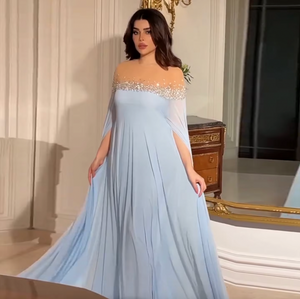 Elevate your style with the Sarah Gown. This exquisite Luxury Crystal Baby Blue Evening Dress is adorned with intricate crystal detailing, ensuring a truly luxurious experience. Perfect for weddings and special occasions, the kaftan style offers a comfortable and flattering fit, making you the center of attention. Order now and be the belle of the ball.