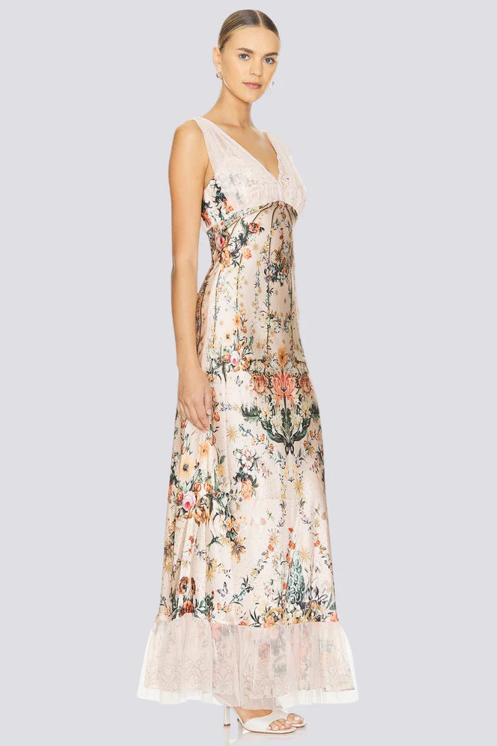 Indulge in the luscious soft pinks of the Rose Garden Maxi Dress. This elegant silk slip dress features a delicate V neckline and bias cut for a flowy, sophisticated look. With delicate shoulder straps and a delicate mesh overlay, this dress is perfect for strolls through palatial rose gardens.