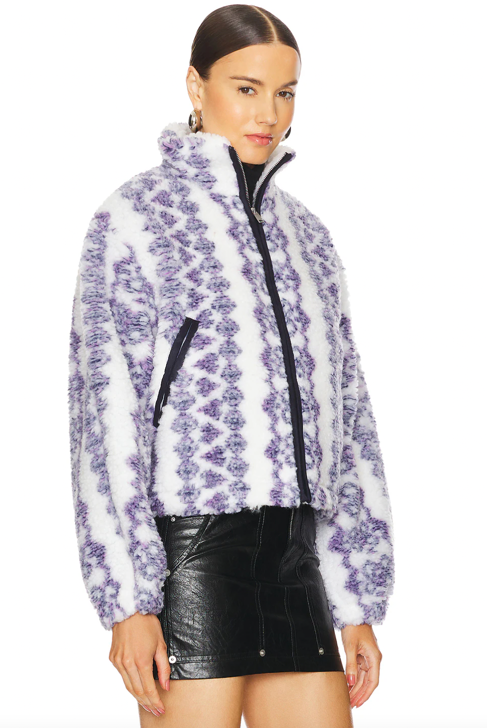 The Mackensy Coat by Isabel Marant features a unique short printed shearling style that is bound to turn heads. With its luxurious design and high-quality materials, this coat is perfect for keeping you warm and stylish during the colder months. Elevate your wardrobe with the Mackensy Coat!