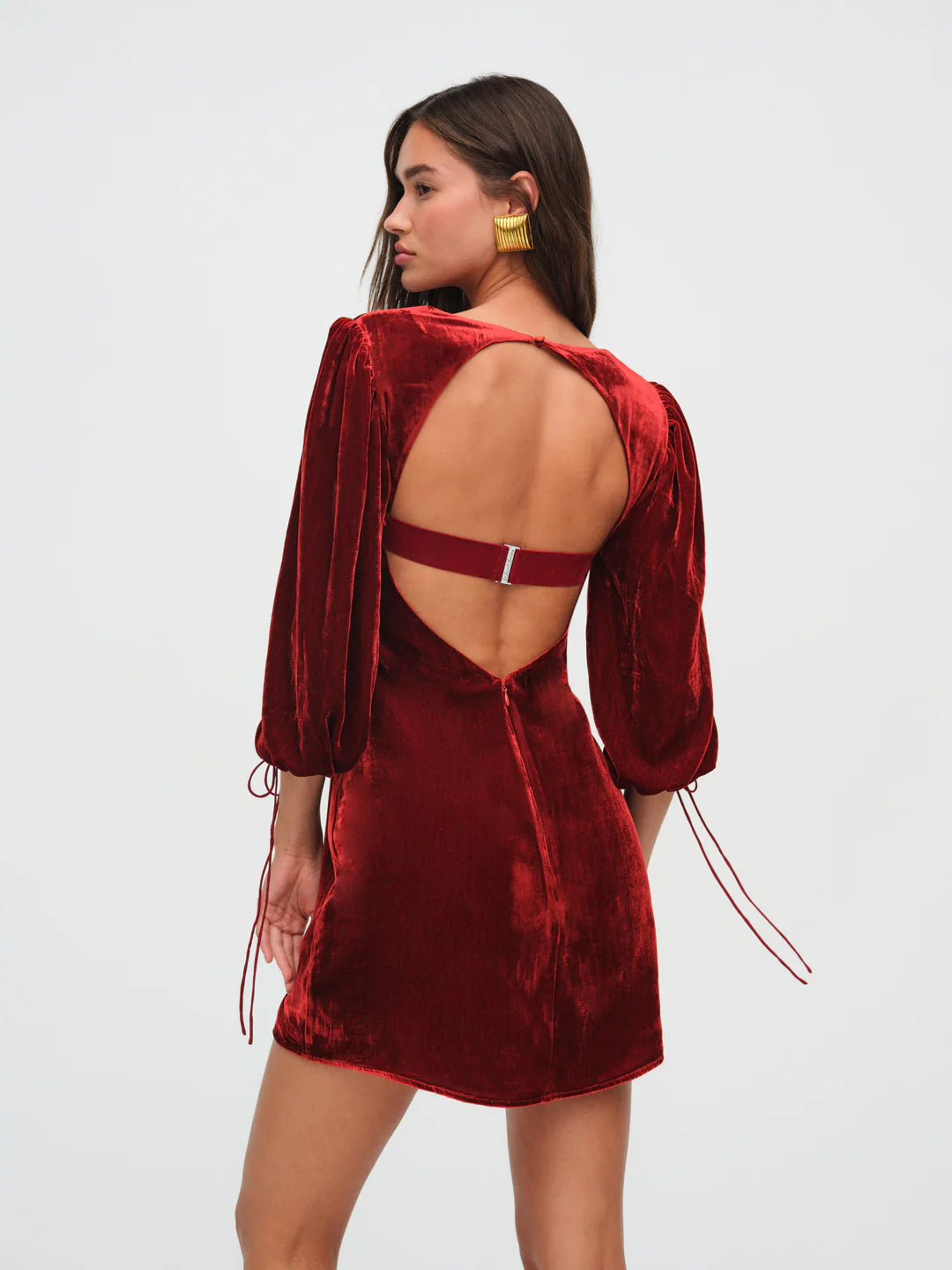 Elevate your date night look with the Nadine Mini Dress. The luxurious velvet and corset design exude elegance and romance. Three-quarter length blouson sleeves and underwire cups create a flattering silhouette, while the sweetheart neckline adds a touch of sensuality. Make a statement in this exclusive and sophisticated piece.