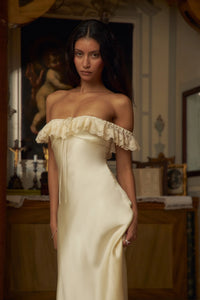 This elegantly designed Sonata Lady Length Dress features an off the shoulder neckline, adding a touch of femininity to your look. The bias cut of the dress and lace trim add a delicate and sophisticated touch. Designed for comfort and support, it includes silicone gripper elastic and boning on the upper bodice. Indulge in luxury and beauty with this dress!