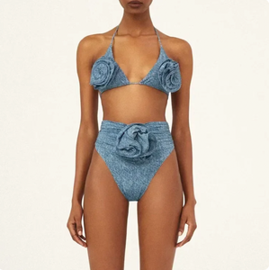 Discover the latest in elegant swimwear with our Ensemble Florette. This 2-piece swimsuit features a delicate lace bra and 3D flower details, perfect for a romantic touch. The set also includes a transparent khaki panty, creating a stunning and flattering silhouette. Upgrade your beach look with comfort and style.