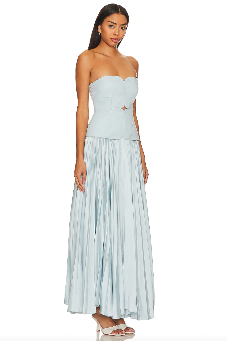 Indulge in the sophistication and elegance of Avonlea Midi Dress. This elegant blue pleated dress features a patchwork design, off-shoulder sleeves, and a slimming silhouette. Perfect for any occasion, it will make you feel confident and sexy. Embrace your femininity with this luxurious and exclusive piece.