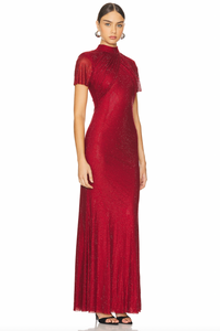 Indulge in pure elegance with the Red Rhinestone Maxi Dress by Self-Portrait! This stunning dress features a rhinestone-studded fishnet design that adds a liquid-like finish. The timeless mock neck and flared skirt create a statuesque silhouette, guaranteed to turn heads. Complete the look with our statement earrings for added sparkle.