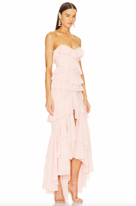 Elevate your style with the Oleksandra Maxi Dress. This luxurious, rose-colored dress features ruffled details and a daring open back, perfect for making a statement at any event. The flowy, sleeveless design and off-the-shoulder silhouette add a touch of elegance to this party-ready piece.