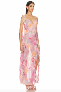 Unleash your inner romantic with the Beate Maxi Dress. With a dreamy rose print and cascading ruffles, this pink asymmetrical dress exudes charm and elegance. The removable shoulder ruffle and thigh-high slit add a touch of playfulness.