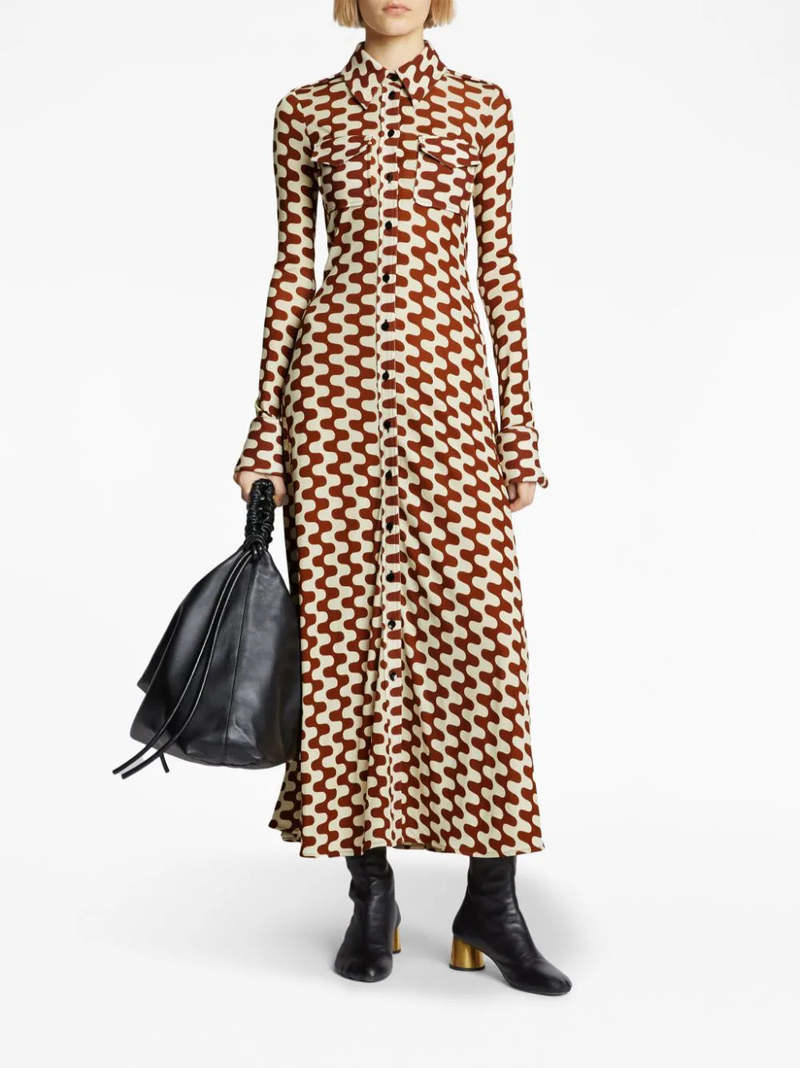 Proenza Schouler's Printed Matte Jersey Shirt Dress is cut to a slim-fitting silhouette and patterned with a retro zigzag motif in wine red and ecru. Finished with a self-tie waist belt and polished gold-tone metal cufflinks.