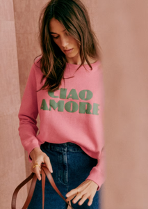 Stay cozy and stylish with the Ciao Amore Long-Sleeved Sweatshirt. Made with 100% organic cotton, this T-shirt features a round neckline and a romantic "Ciao Amore" print on the chest. Perfect for any occasion, this sweatshirt adds a touch of personality to your wardrobe.