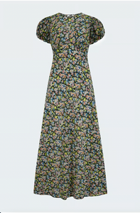 Indulge in effortless elegance with the DÔEN's ditsy floral dress. With delicate puffed sleeves and a flowy fit, this cotton silhouette falls just above the ankle for a chic and easy wear. Featuring a round neckline and tie detail at the back, it's perfect for any occasion - from chic ballet flats to stylish heels.