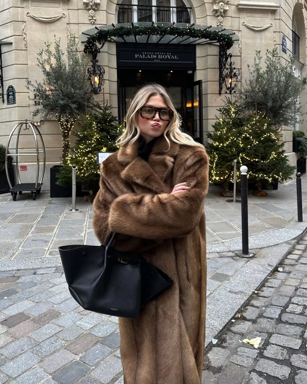 Elevate your style with the Daphne Shearling Coat. This faux fur masterpiece seamlessly blends textures and patterns for a luxurious and sophisticated aesthetic. The camel-colored coat not only adds warmth but also exudes opulence. Make a statement and elevate your wardrobe with this must-have piece.