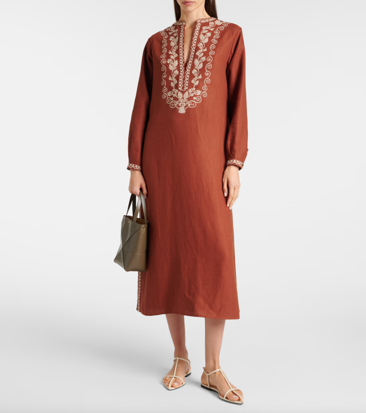 Expertly crafted by Loro Piana, the Faye embroidered linen kaftan exudes refined elegance. Made with the finest quality linen, this kaftan features intricate embroidery for a touch of sophistication. With its timeless design, this kaftan is the perfect addition to any wardrobe for a luxurious and stylish look.