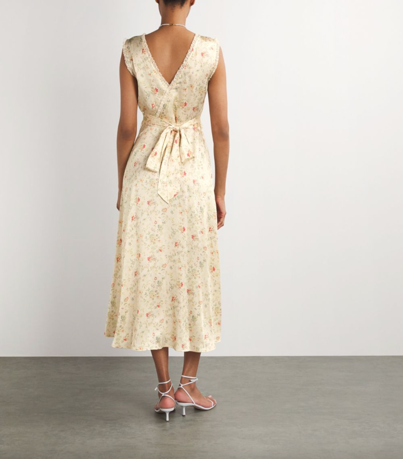 Embrace your adventurous side with the Silk Floral Tahlia Midi Dress. This versatile design can be dressed up with heels for a night out or dressed down for a casual sunset stroll through an orchard. With its bold floral pattern and flowing silhouette, it's perfect for any risk-taker looking to make a statement.