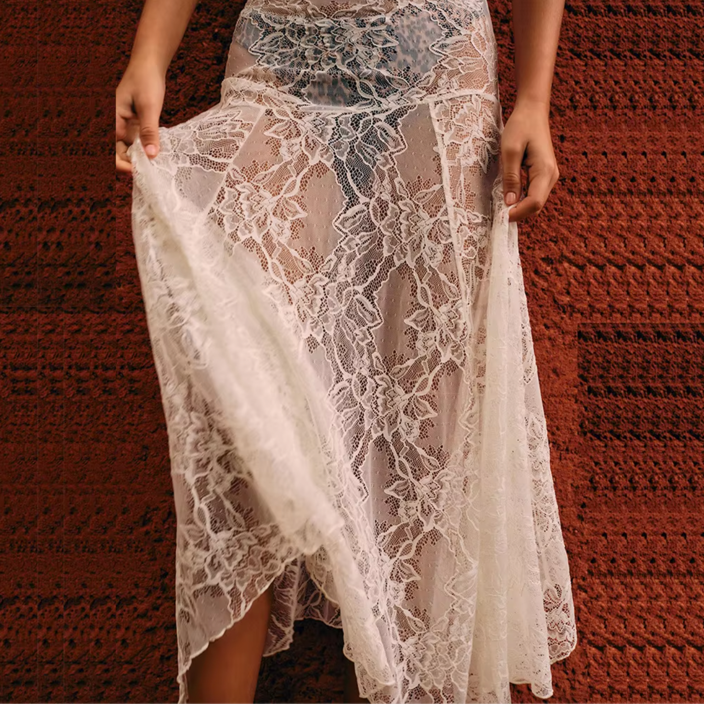 Elevate your style with the Lainey Lace Skirt. This stunning maxi skirt features a high waist for a flattering fit, and a see-through white lace design for a touch of allure. Perfect for a day at the beach or dressing up for a holiday, this skirt will add a playful and sexy vibe to your wardrobe.