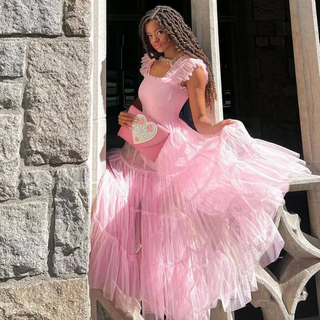 Experience luxury with this exquisite mesh pink dress featuring flying sleeves, a sweet square collar, and pleated splice A-line design. Perfect for elegant parties and evening events, this dress will have you feeling confident and sophisticated.