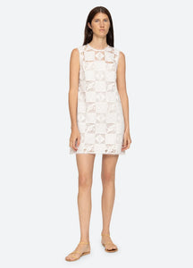 Experience elegance and beauty in the Melia Mini Dress by SEA NY. This luxurious tank dress features a delicate floral embroidered patchwork design that is both sophisticated and exclusive. Its mini silhouette adds a touch of playfulness, making it the perfect addition to your wardrobe for any occasion.