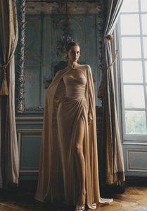 Strapless, side draped gown with sweetheart neckline and front slit in matte jersey.  Pair with the coordinating Floor Length Jersey Cape to complete the look