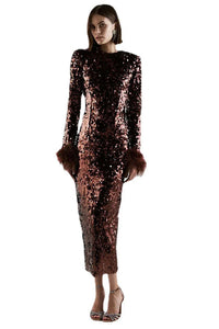 The Sequinned Zouzou Midi Dress is a stunning piece that exudes elegance and luxury. Featuring an O-neck and long sleeves, this dress is adorned with sequins and feathers, creating a beautiful and eye-catching design. Perfect for formal events or a night out, this bodycon dress will make you feel like a celebrity.