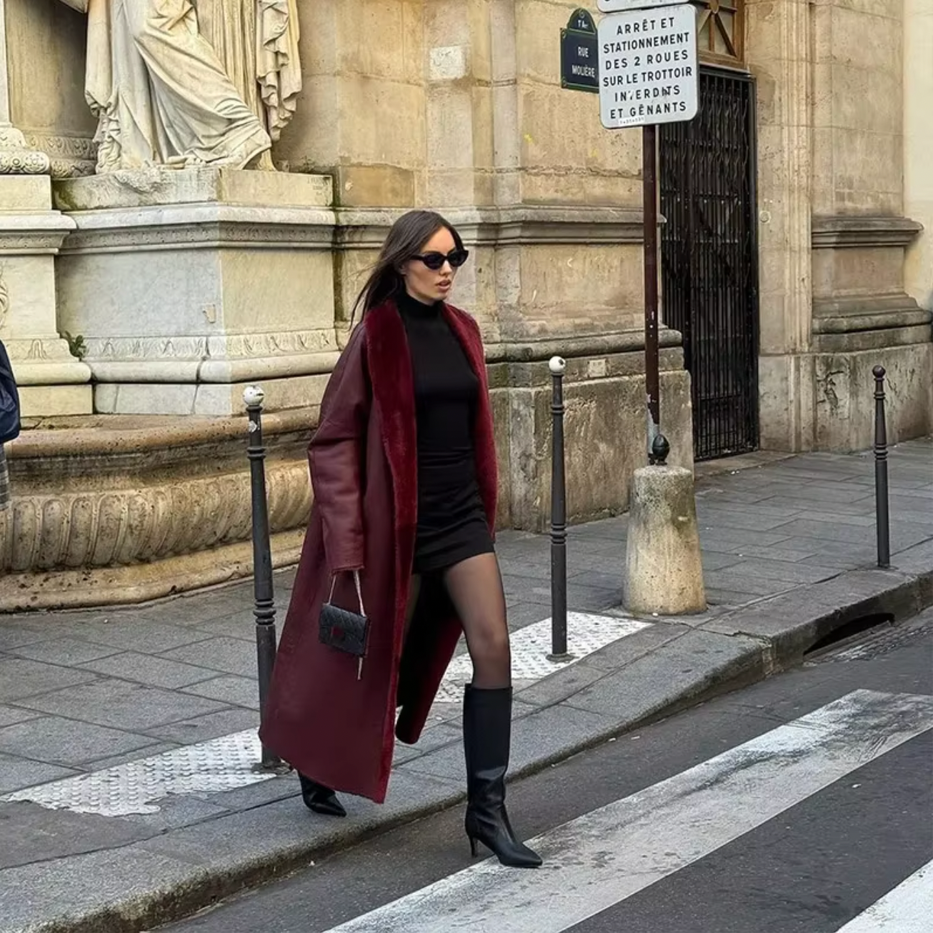 Stay warm and stylish with the Ana Shearling Coat! This women's overcoat features double-sided fur and premium leather for a luxurious touch. The chic burgundy color, elegant lapel, and lace-up details add a touch of glamour to your winter wardrobe. The adjustable belt provides a flattering fit while keeping you cozy. (Winter just got a lot more chic!)