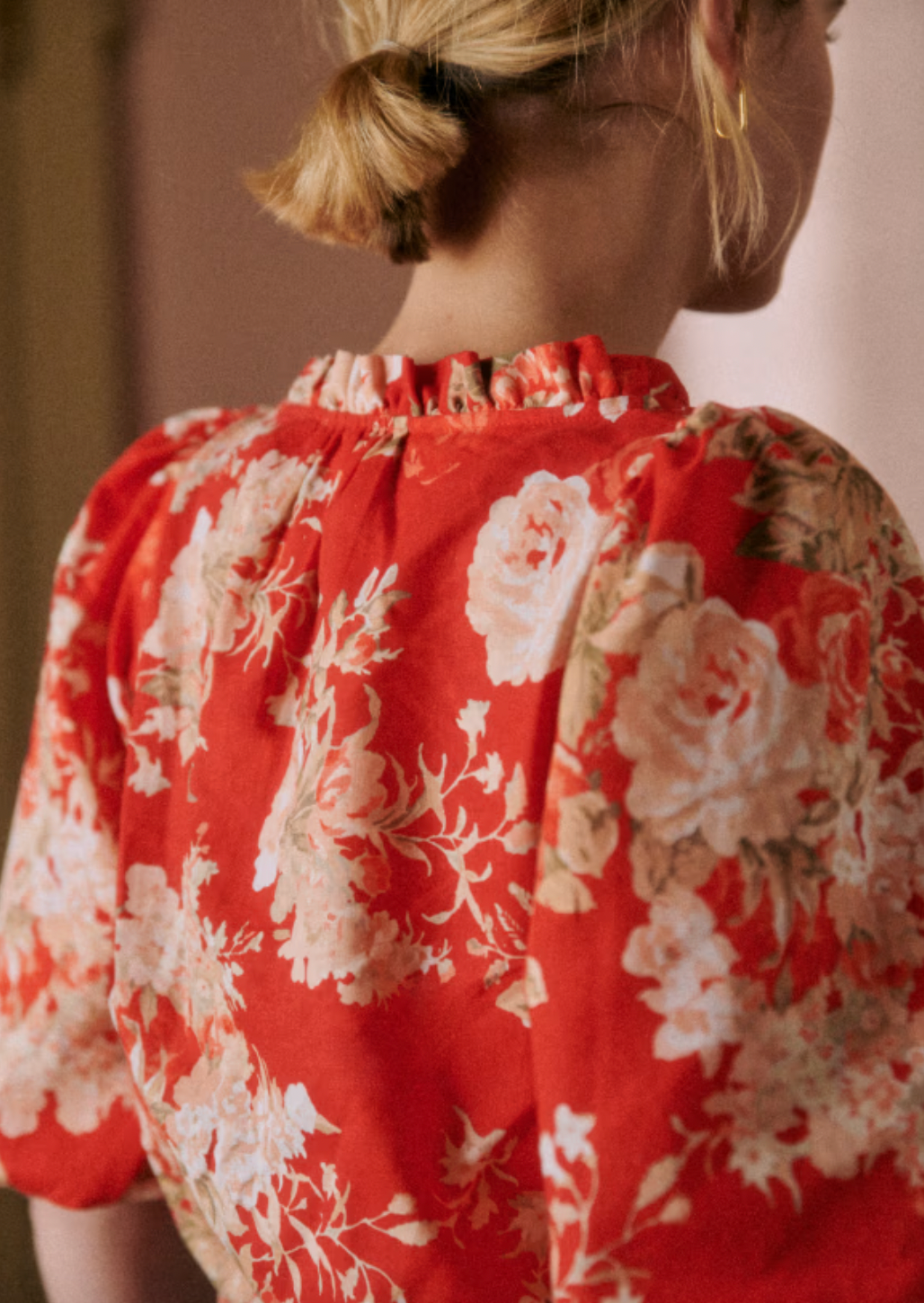 Introducing the Kellia Blouse, a must-have for any spring or summer wardrobe. This lightweight blouse features trendy puffed sleeves, a square neckline, and vibrant red floral accents. Elevate your style with this feminine and chic piece.