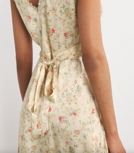 Embrace your adventurous side with the Silk Floral Tahlia Midi Dress. This versatile design can be dressed up with heels for a night out or dressed down for a casual sunset stroll through an orchard. With its bold floral pattern and flowing silhouette, it's perfect for any risk-taker looking to make a statement.