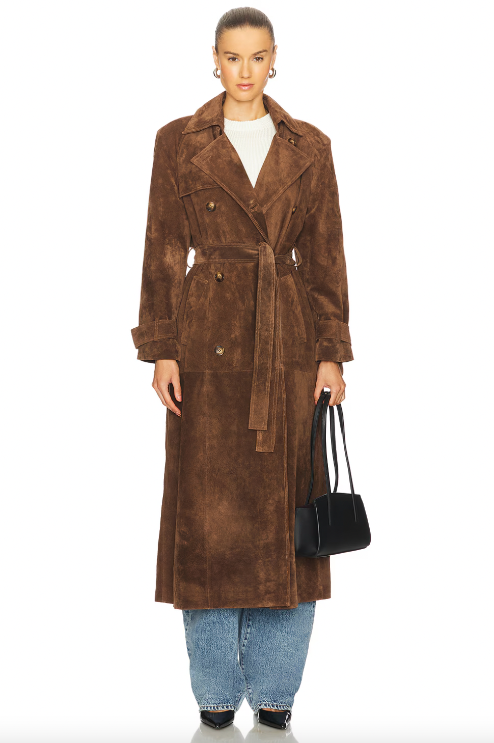 Elevate your style with the Corrin Suede Trench Coat by Ducie. Crafted from luxurious suede leather, this double breasted trench is complete with a storm flap and leather sash for a sophisticated touch. Its cocooning design and satin lining make it a timeless addition to your wardrobe.