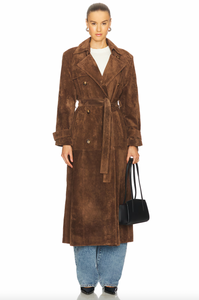 Elevate your style with the Corrin Suede Trench Coat by Ducie. Crafted from luxurious suede leather, this double breasted trench is complete with a storm flap and leather sash for a sophisticated touch. Its cocooning design and satin lining make it a timeless addition to your wardrobe.