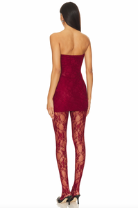 Expertly crafted in England, the Bruna Dress offers effortless elegance with its pull-on styling and delicate lace fabric. Hand washable for easy maintenance, it also features attached lace tights lining for a touch of femininity. Perfect for any occasion, its strapless design adds a touch of sophistication to your wardrobe.